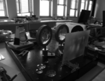 Lenses and mirrors on a desk